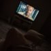 A person watching Tv